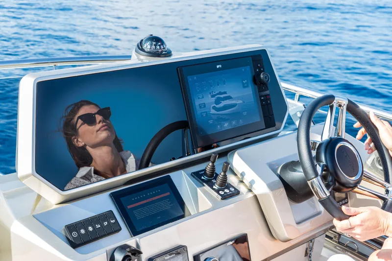  Yacht Photos Pics Helm of 2026 Galeon 480 Fly yacht with modern navigation display.