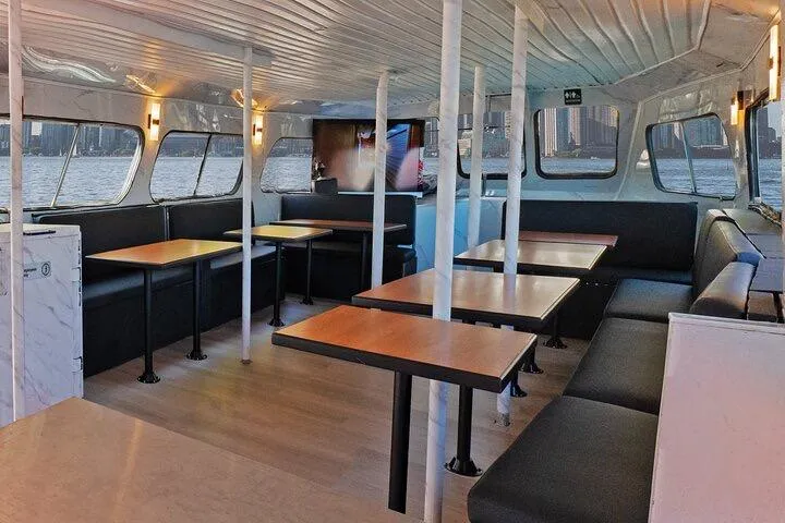 Island Princess Yacht Photos Pics Interior of 1983 Custom Steel Passenger boat, seating for 120, with tables and windows.