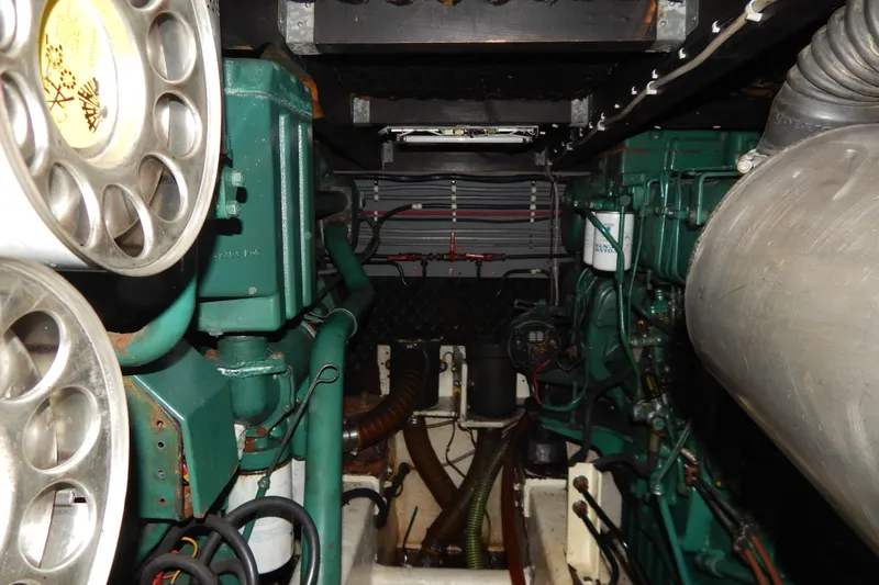  Yacht Photos Pics Engine room of a 1992 Fairline 50 yacht, showcasing mechanical components and wiring.