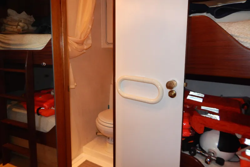  Yacht Photos Pics Interior of 1992 Fairline 50 yacht showing bunk beds and bathroom.