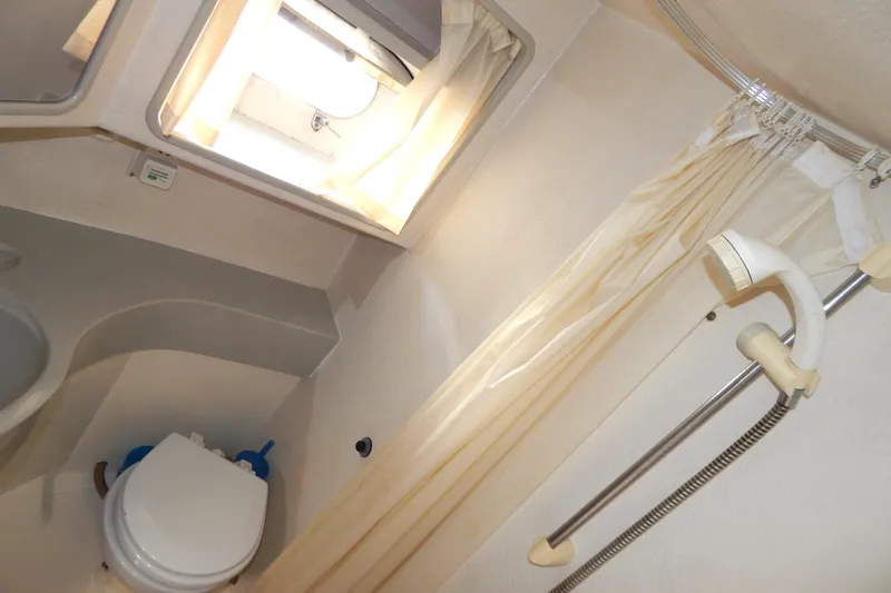  Yacht Photos Pics Bathroom interior of 1992 Fairline 50 yacht with shower and toilet.