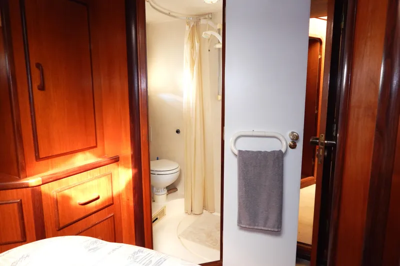  Yacht Photos Pics Interior of 1992 Fairline 50 yacht showing bathroom and wooden cabinetry.