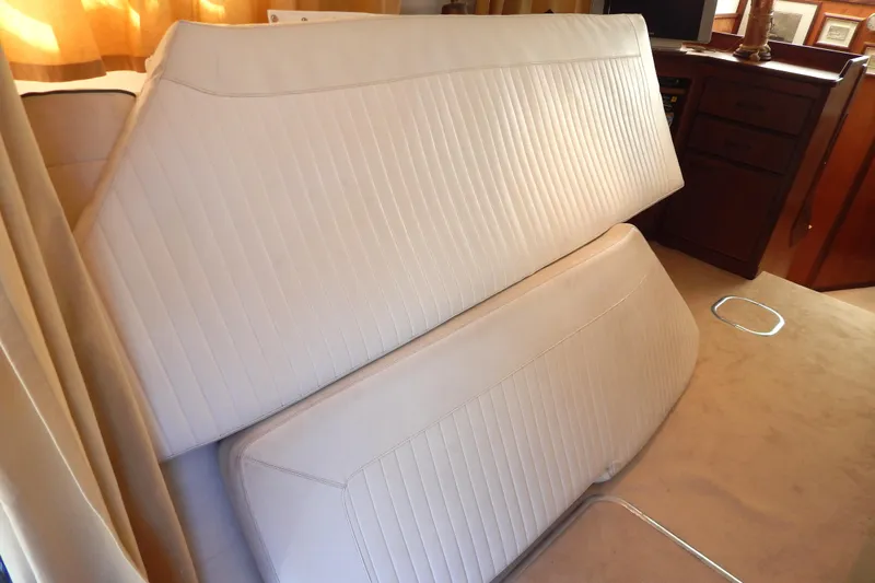  Yacht Photos Pics Interior of 1992 Fairline 50 yacht with white upholstered seating.