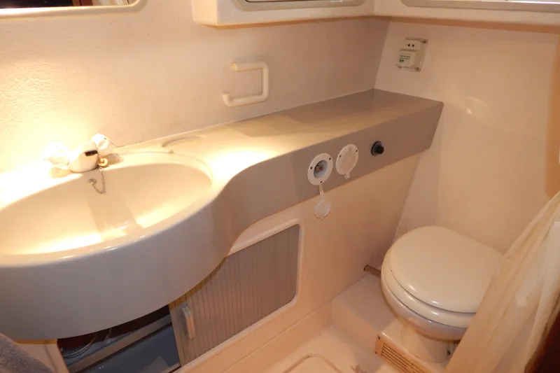  Yacht Photos Pics Bathroom interior of 1992 Fairline 50 yacht with sink and toilet.