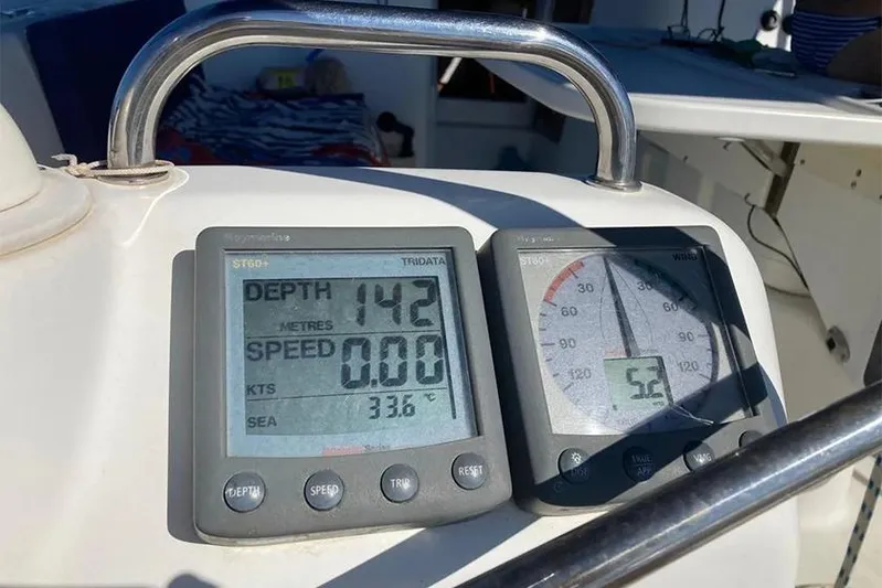  Yacht Photos Pics Beneteau Cyclades 50 yacht instruments showing depth, speed, and sea temperature.