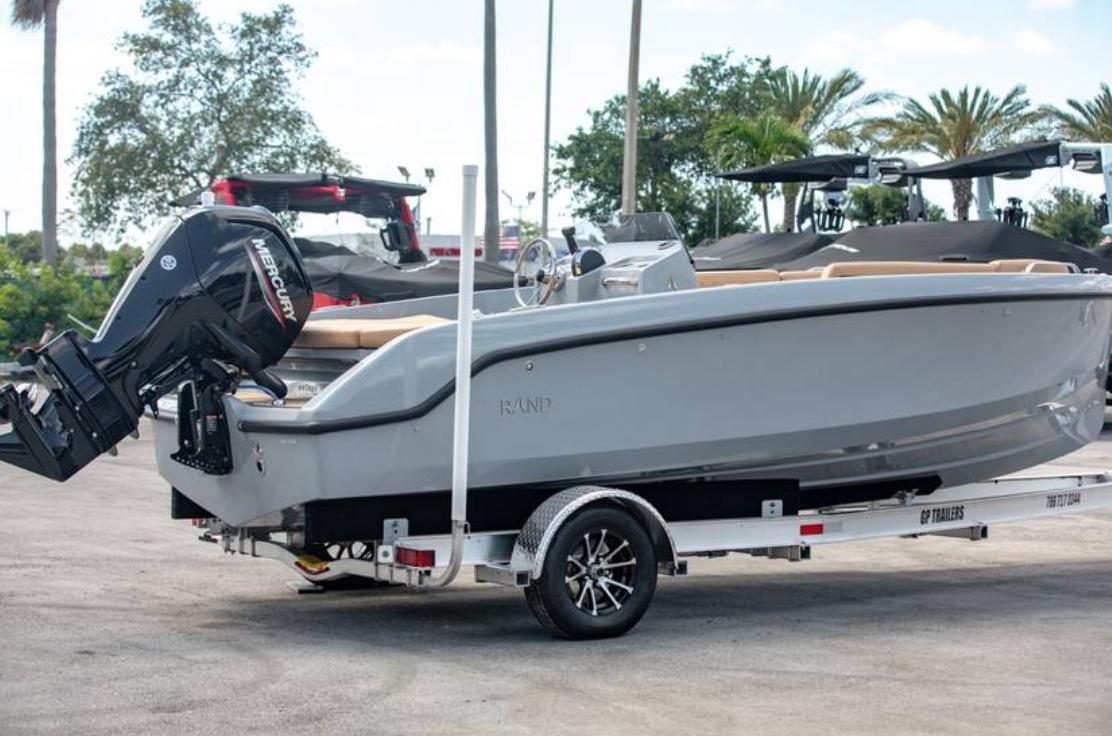 2022 Rand BREEZE boat on a trailer with Mercury outboard motor.