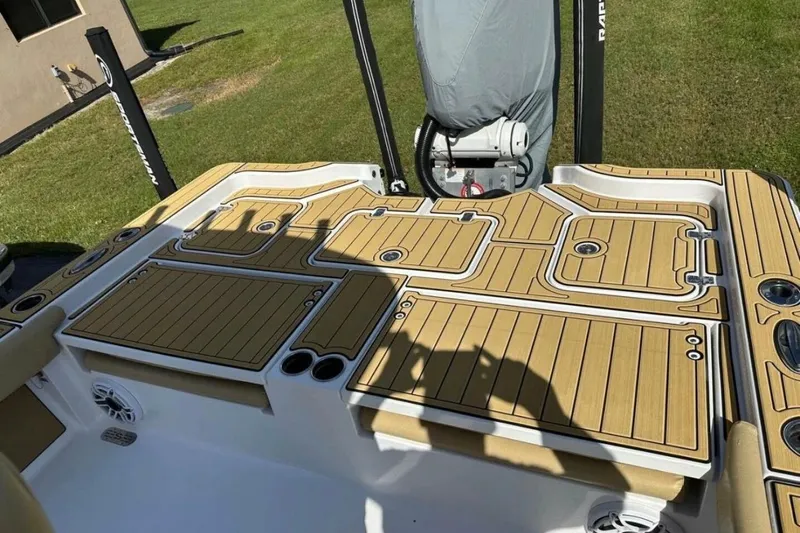  Yacht Photos Pics 2023 Sportsman Masters 267 Bay Boat deck with tan and white detailing.