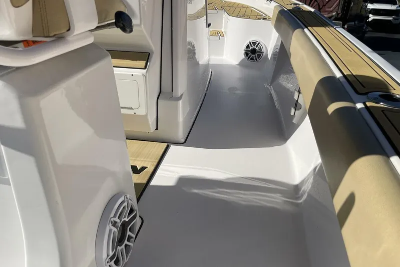  Yacht Photos Pics 2023 Sportsman Masters 267 Bay Boat interior with seating and speaker detail.