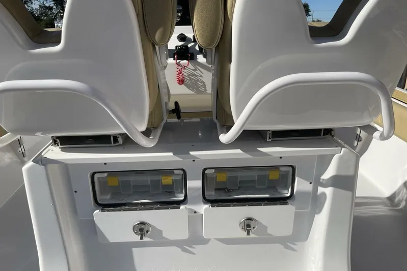  Yacht Photos Pics 2023 Sportsman Masters 267 Bay Boat interior with dual seats and storage compartments.
