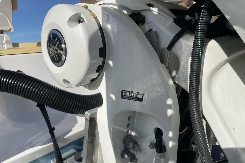  Yacht Photos Pics Close-up of 2023 Sportsman Masters 267 Bay Boat engine components.