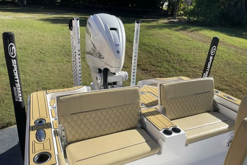  Yacht Photos Pics 2023 Sportsman Masters 267 Bay Boat with Yamaha engine and cushioned seating.