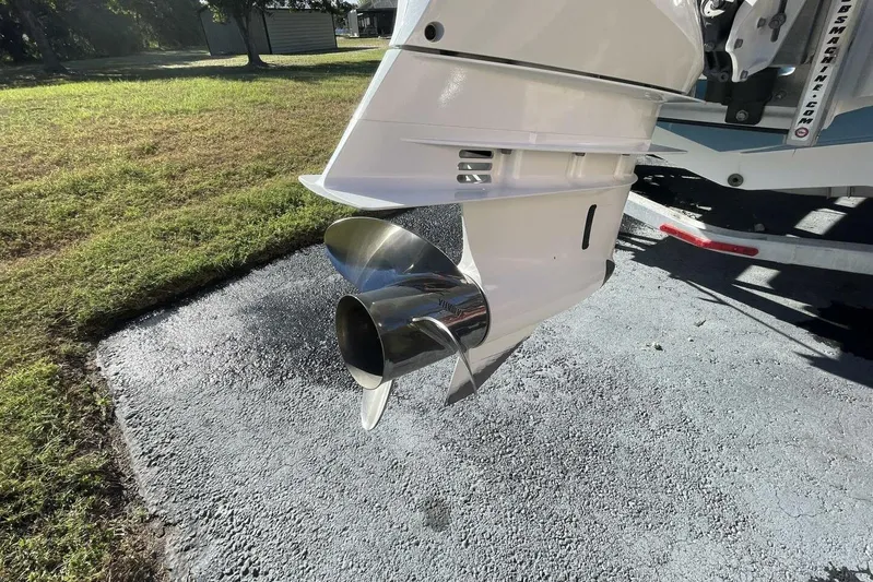  Yacht Photos Pics 2023 Sportsman Masters 267 Bay Boat propeller on a sunny day.