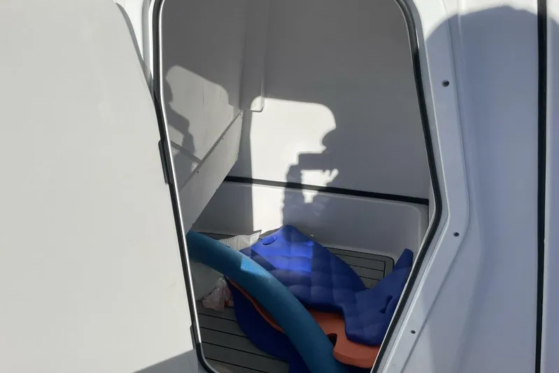  Yacht Photos Pics Interior view of 2023 Sportsman Masters 267 Bay Boat storage compartment.