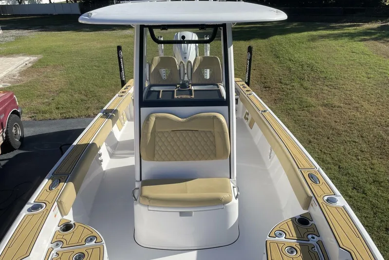  Yacht Photos Pics 2023 Sportsman Masters 267 Bay Boat with tan seating and sleek design.