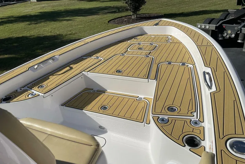  Yacht Photos Pics 2023 Sportsman Masters 267 Bay Boat with sleek deck design and seating.