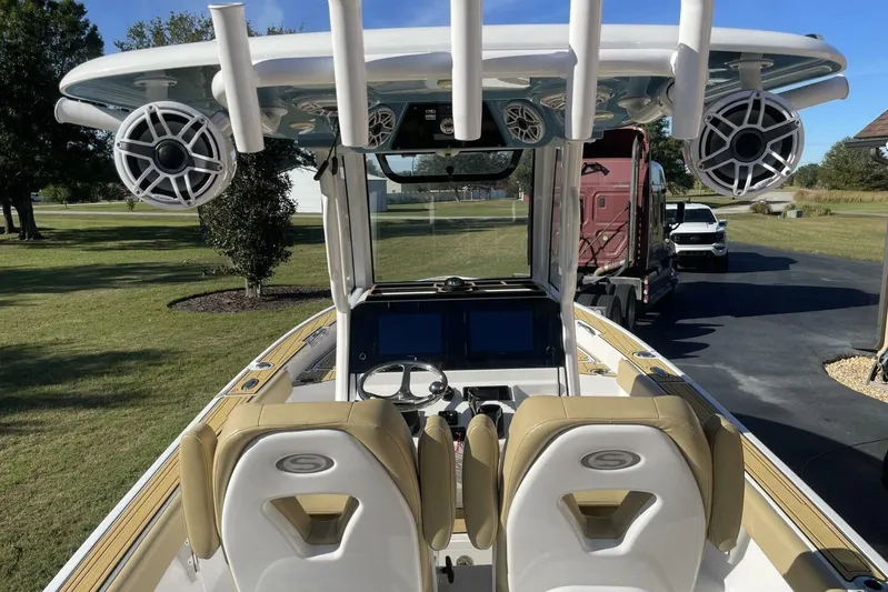  Yacht Photos Pics 2023 Sportsman Masters 267 Bay Boat interior with dual seats and advanced dashboard.