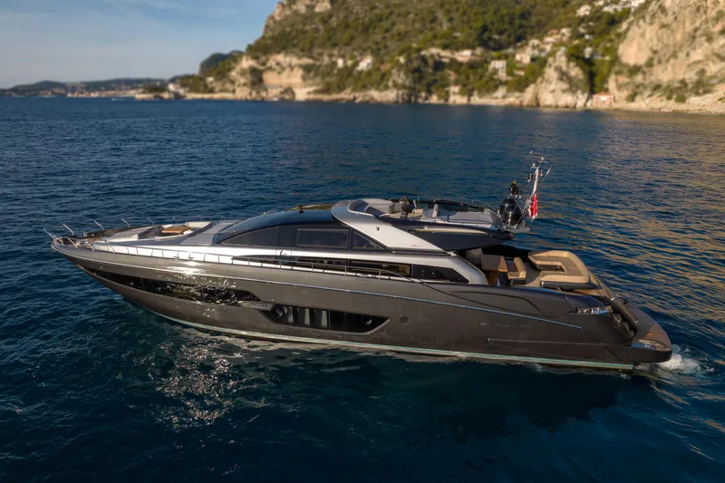  Yacht Photos Pics 2019 Riva 88 Domino Super yacht cruising on serene blue waters.
