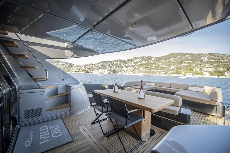  Yacht Photos Pics Luxurious 2019 Riva 88 Domino Super yacht deck with elegant seating and scenic views.