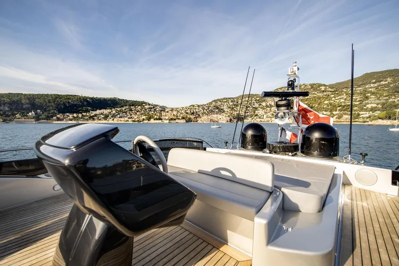  Yacht Photos Pics 2019 Riva 88 Domino Super yacht deck with scenic coastal view.