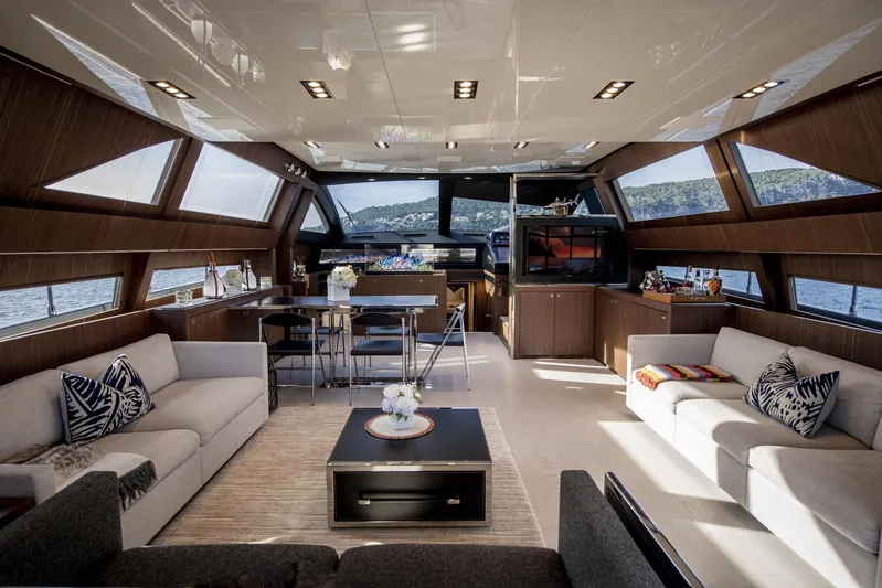  Yacht Photos Pics Luxurious interior of 2019 Riva 88 Domino Super yacht with modern furnishings and panoramic windows.