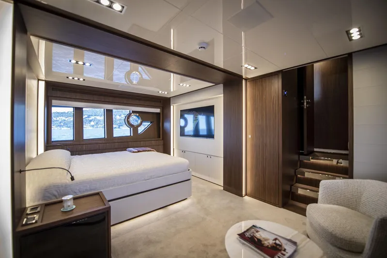 Yacht Photos Pics Luxurious bedroom interior of 2019 Riva 88 Domino Super yacht with modern design elements.