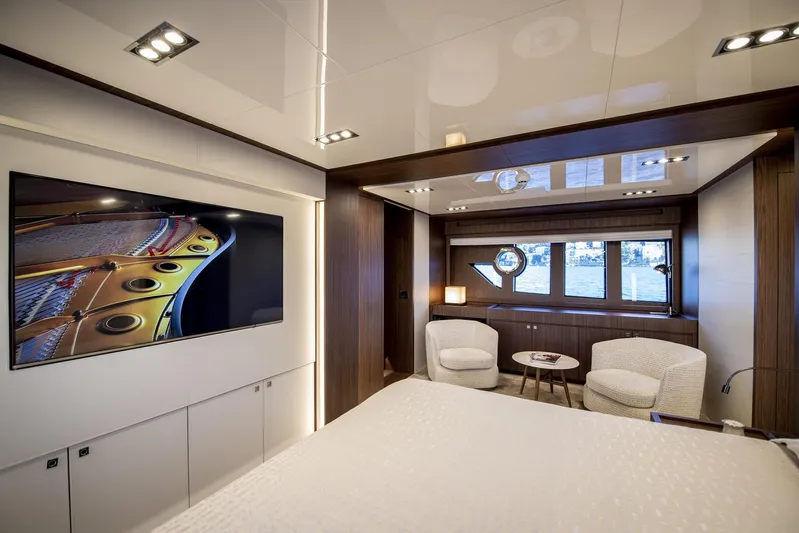 Yacht Photos Pics Luxurious interior of 2019 Riva 88 Domino Super yacht with modern decor and large windows.