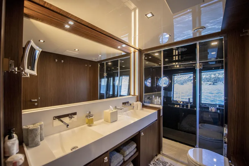  Yacht Photos Pics Luxurious bathroom interior of 2019 Riva 88 Domino Super yacht with modern fixtures.
