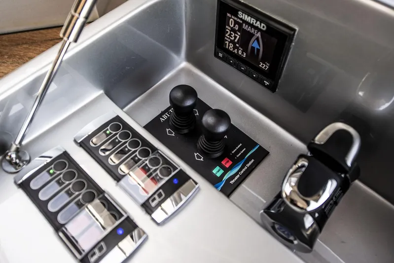  Yacht Photos Pics Control panel of 2019 Riva 88 Domino Super yacht with Simrad display and joystick controls.