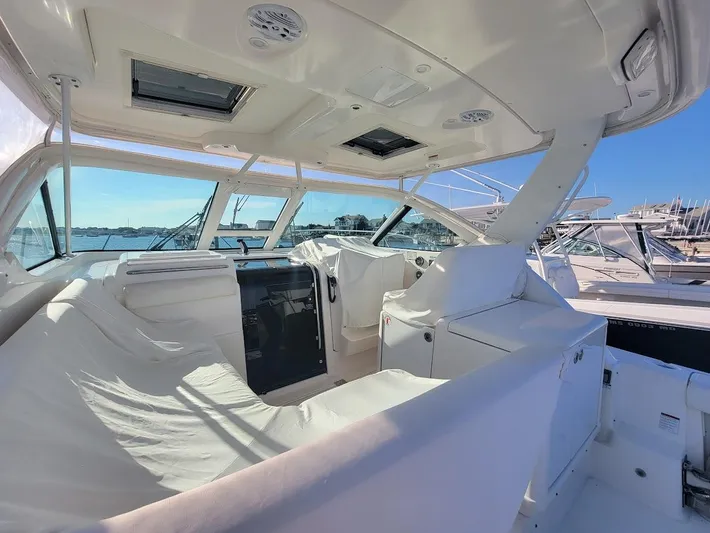  Yacht Photos Pics 2006 Tiara Yachts 3200 Open interior with white seating and panoramic windows.