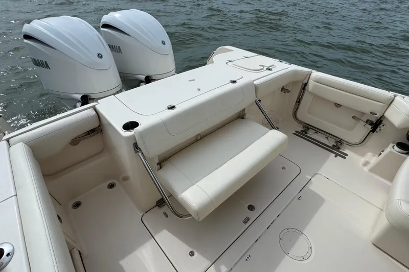 That's What She Said Yacht Photos Pics 2023 Grady-White Freedom 285 boat with dual Yamaha engines, featuring spacious seating.