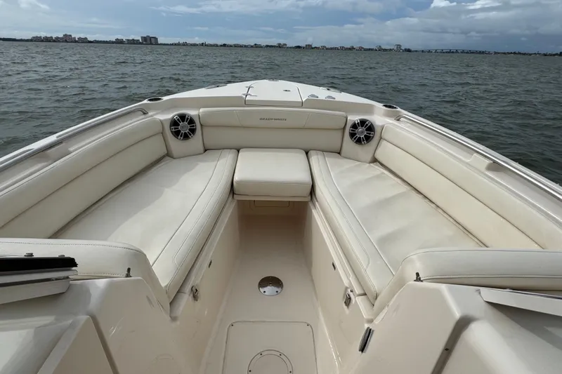 That's What She Said Yacht Photos Pics 2023 Grady-White Freedom 285 boat interior with cushioned seating on open water.