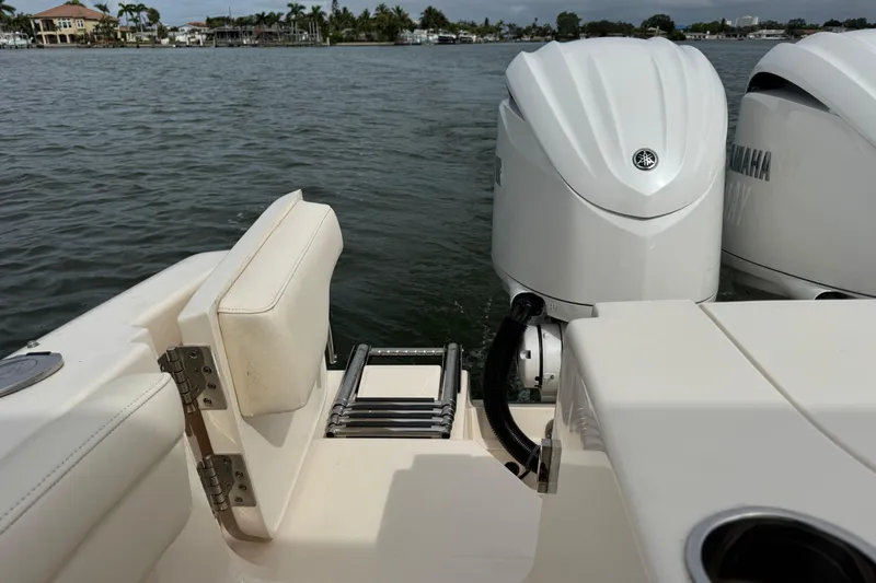 That's What She Said Yacht Photos Pics 2023 Grady-White Freedom 285 boat with Yamaha outboard engines on a calm lake.