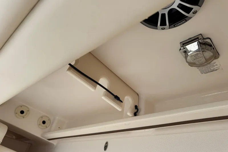 That's What She Said Yacht Photos Pics 2023 Grady-White Freedom 285 boat interior with speaker and storage features.