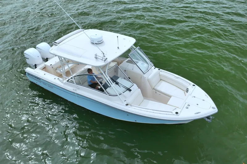 That's What She Said Yacht Photos Pics 2023 Grady-White Freedom 285 boat on green water, aerial view.