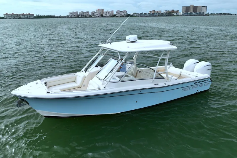 That's What She Said Yacht Photos Pics 2023 Grady-White Freedom 285 boat on water, showcasing sleek design and dual engines.