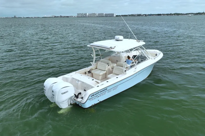 That's What She Said Yacht Photos Pics 2023 Grady-White Freedom 285 boat on open water, featuring twin Yamaha engines.