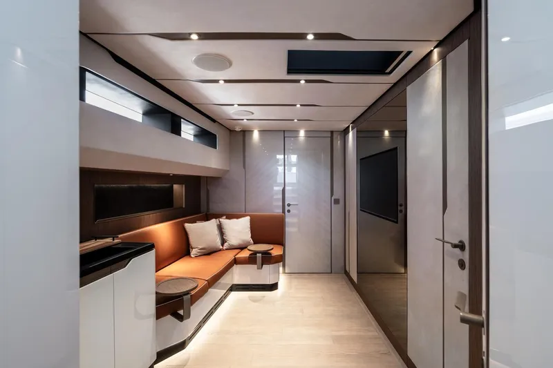  Yacht Photos Pics Luxurious interior of 2024 Wider Wilder 60 yacht with modern seating and sleek design.