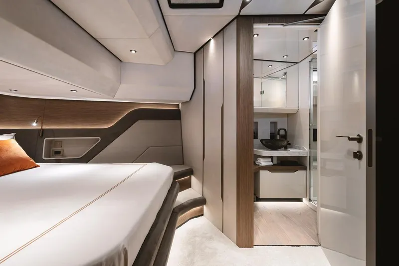  Yacht Photos Pics Luxurious interior of 2024 Wider Wilder 60 yacht cabin with modern design and ensuite bathroom.