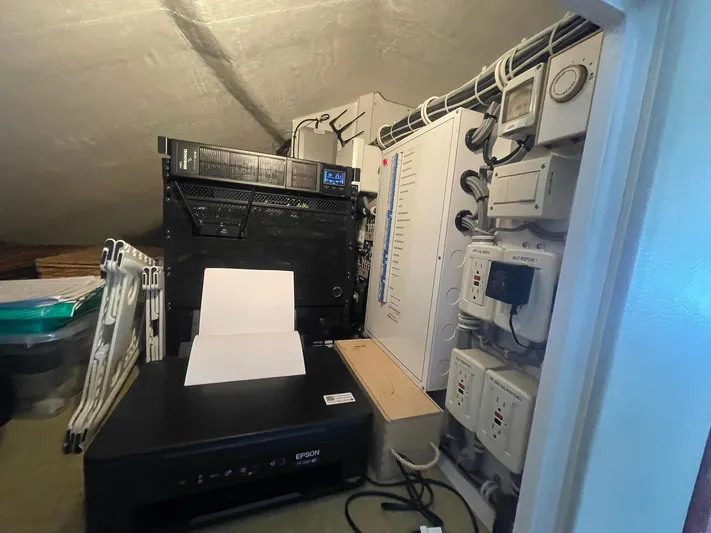 Caraibi Yacht Photos Pics Electrical control panel and equipment inside a Hatteras GT63 yacht, 2013 model.