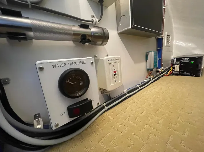 Caraibi Yacht Photos Pics Control panel and wiring inside a 2013 Hatteras GT63 yacht.