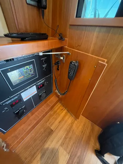 Caraibi Yacht Photos Pics 2013 Hatteras GT63 yacht interior with control panel and communication device.