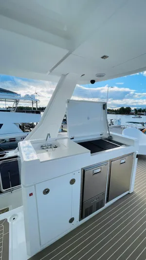  Yacht Photos Pics Outdoor kitchen on 2023 Leopard 53 yacht with sink and grill.