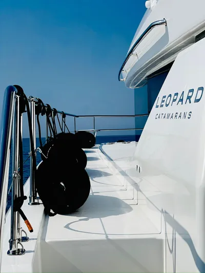  Yacht Photos Pics 2023 Leopard 53 catamaran deck with sleek design and ocean view.