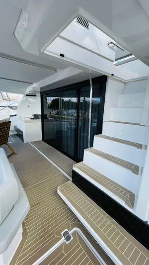  Yacht Photos Pics Modern Leopard 53 yacht interior with sleek stairs and elegant design, 2023 model.