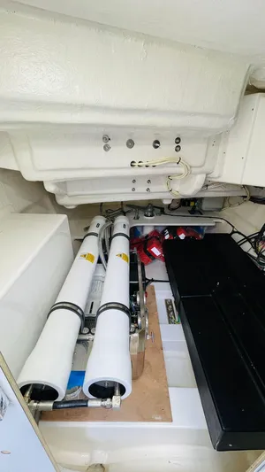  Yacht Photos Pics Engine room of a 2023 Leopard 53 yacht, featuring mechanical components and equipment.