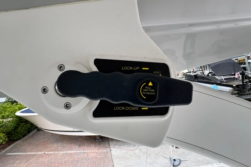  Yacht Photos Pics 2024 Regal LX9 boat lock mechanism with handle, featuring lock-up and lock-down options.