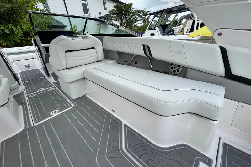  Yacht Photos Pics 2024 Regal LX9 boat interior with sleek white seating and modern design elements.