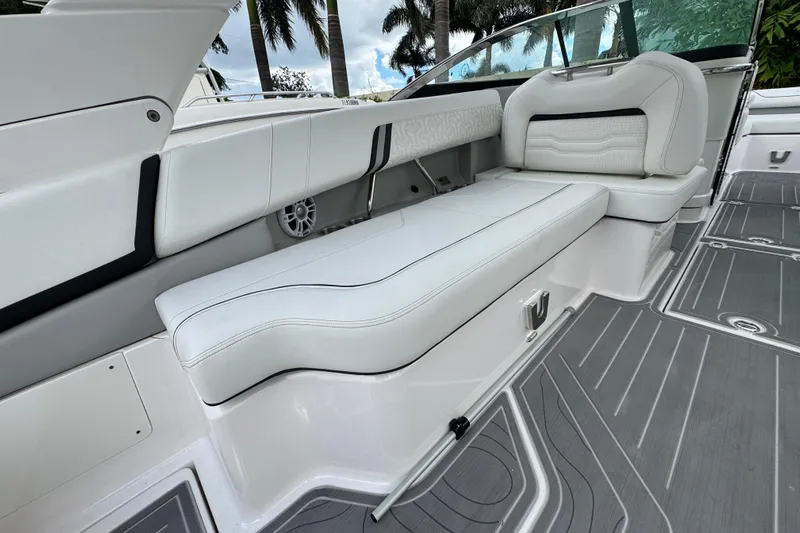  Yacht Photos Pics 2024 Regal LX9 boat interior with luxurious white seating and sleek design.