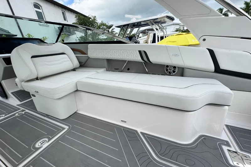  Yacht Photos Pics 2024 Regal LX9 boat interior with luxurious white seating and modern design.