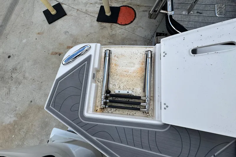 Yacht Photos Pics 2024 Regal LX9 boat ladder and deck detail, featuring stainless steel components.